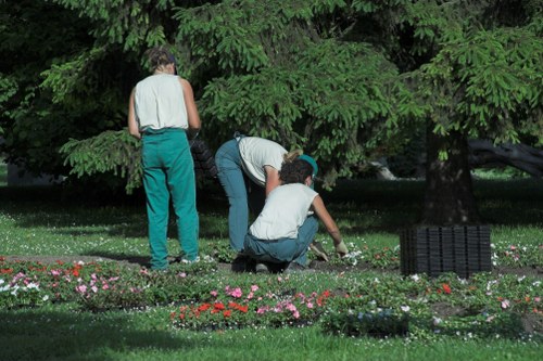 Professional gardeners maintaining Shadwell gardens